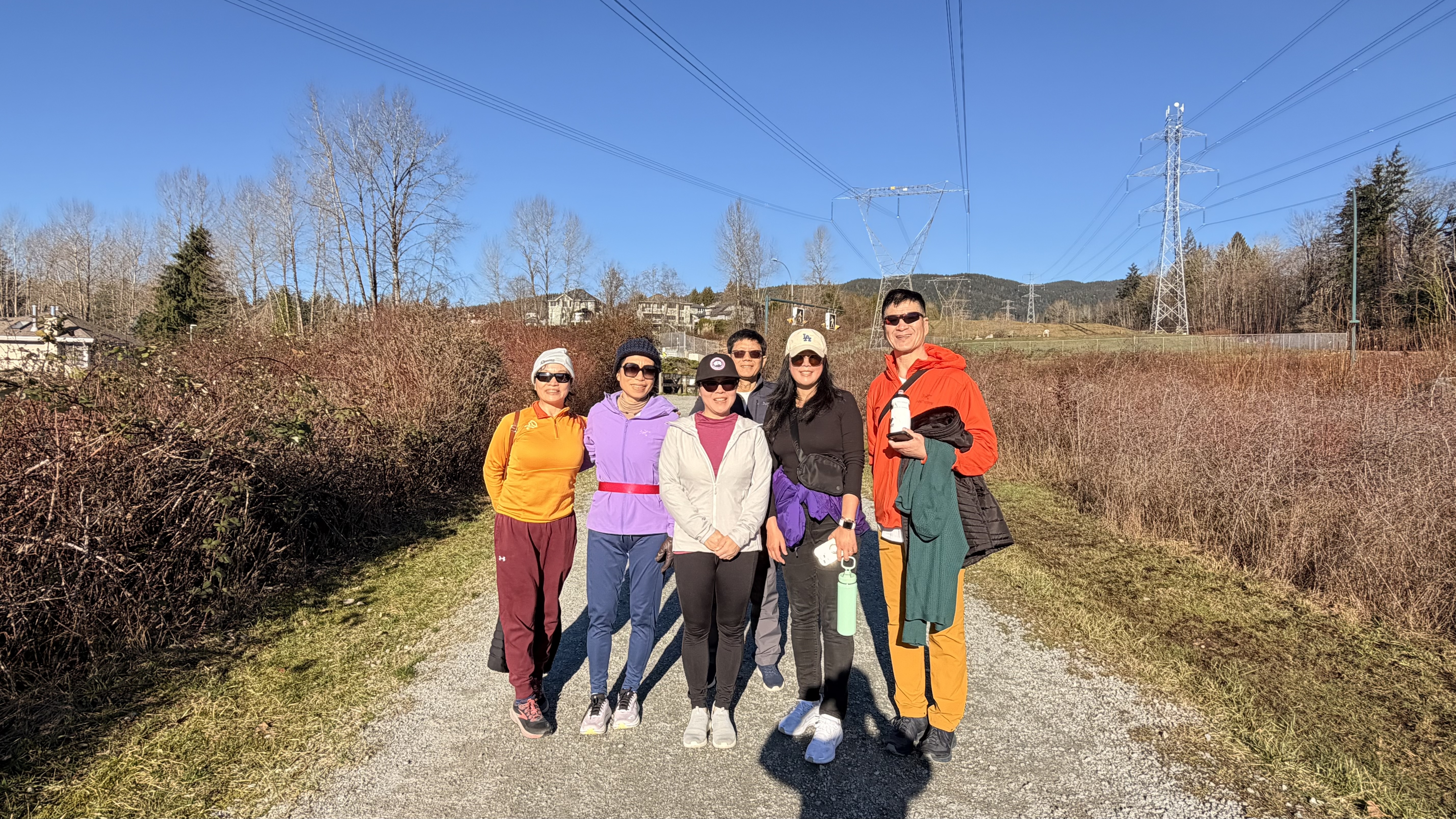 Patrick Ni leading students hiking Coquitlam Crunch, practicing core engagement